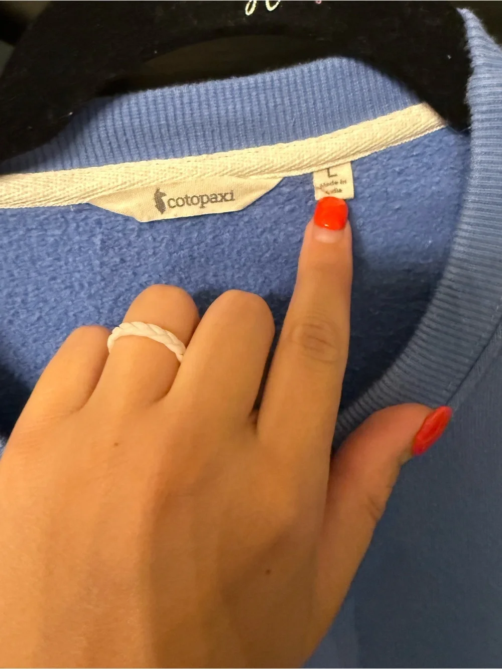 cotopaxi blue crewneck sweater with multicolor stripe logo